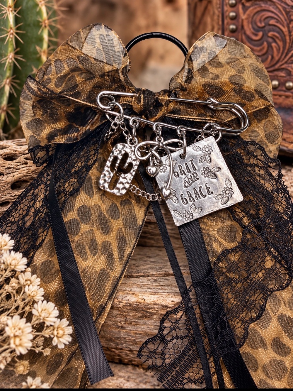 Grit and Grace Leopard Bow keychain / bag charm in Brown and Black animal print.